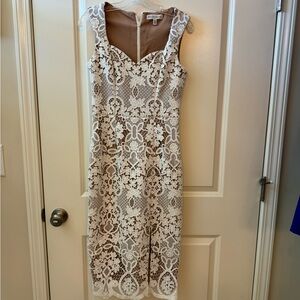 Gorgeous bridal shower or rehearsal dinner dress. Intricate lace details